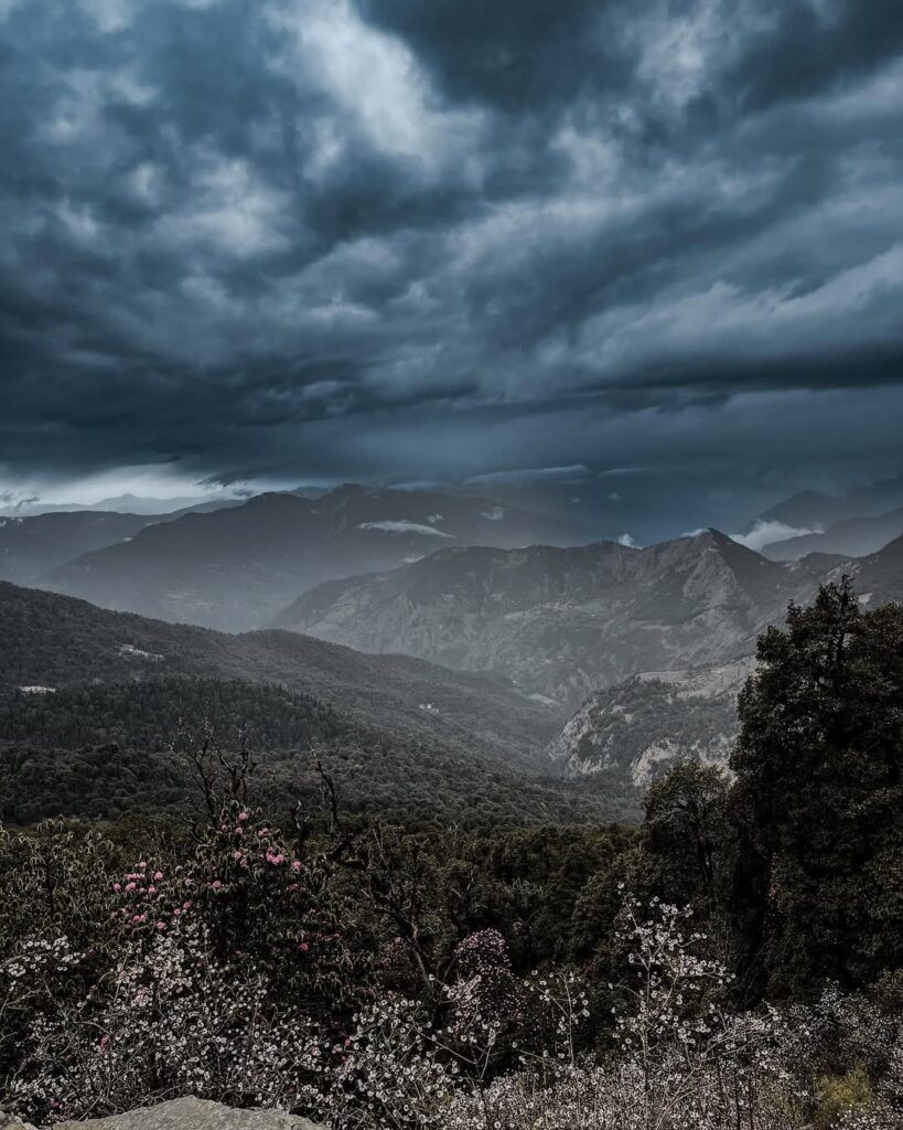 Dramatic mountains under dark stormy skies
